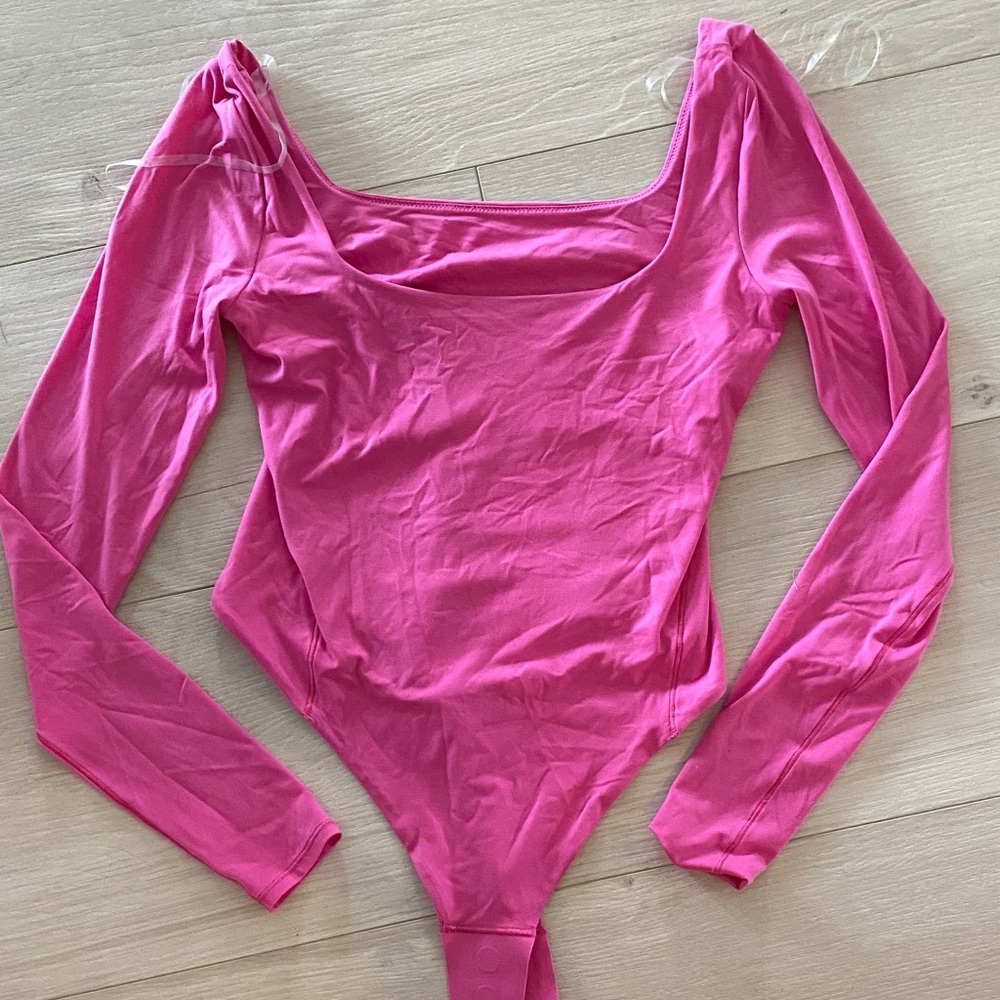 Wundermost Long Sleeve Bodysuit in bubblegum pink colour